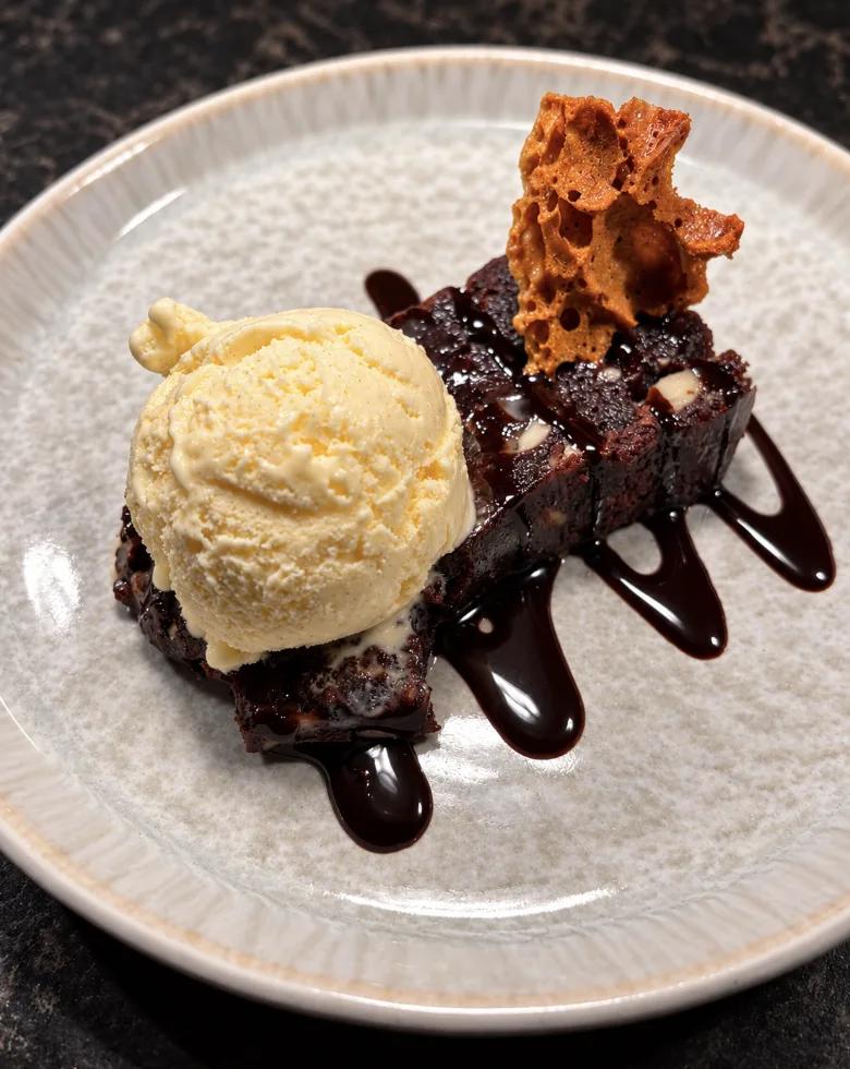 Chocolate brownie with honeycomb and vanilla ice cream
